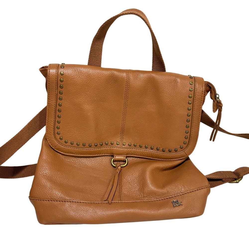 The Sak caramel brown leather messenger bag studded backpack Boho casual purse